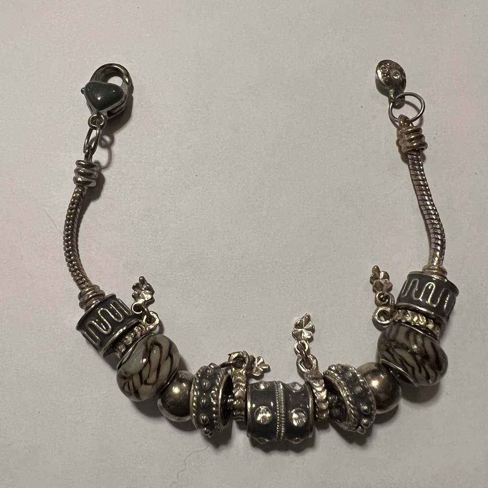 Silver tone charm bracelet